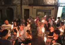 Fiaccolata in ricordo morti incendio Cosenza