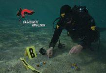 Pistola e munizioni trovate in mare