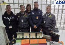 Orologi e articoli di lusso contraffatti sequestrati in aeroporto a Lamezia Terme