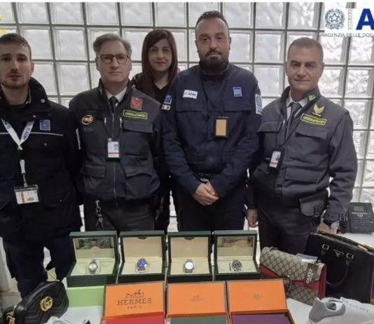 Orologi e articoli di lusso contraffatti sequestrati in aeroporto a Lamezia Terme