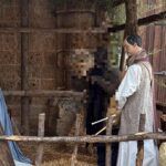 Si mimetizza tra le statue del presepe, arrestato latitante